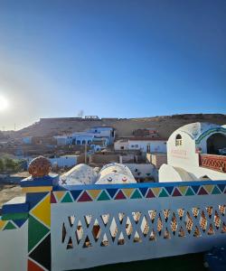 a view of a group of buildings in a city at ASKALEIH Nubian Guest House in Aswan
