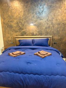 Giường trong phòng chung tại Nuree Bungalow 2