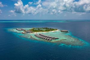 an aerial view of an island in the ocean at Kagi Maldives Resort & Spa in North Male Atoll