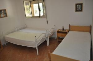 Postel nebo postele na pokoji v ubytování Casa Andrea