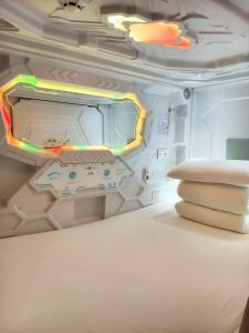 Postel nebo postele na pokoji v ubytování Take A Nap Hotel