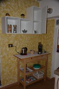 A kitchen or kitchenette at Casa Gibiseo