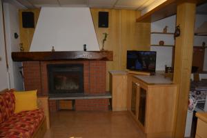 A kitchen or kitchenette at Casa Gibiseo