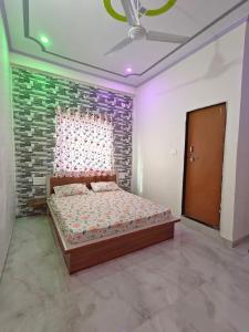 Lova arba lovos apgyvendinimo įstaigoje Hotel Ankit Palace