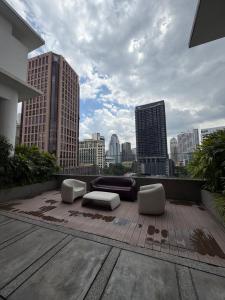 Et opholdsområde på Quill Residence Suites KLCC By Sara