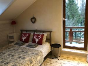 Postel nebo postele na pokoji v ubytování Willa Avita