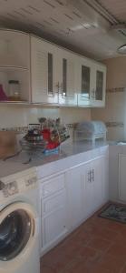 Nhà bếp/bếp nhỏ tại สิรีนโฮมสเตย์Serene Homestay