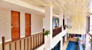 TV a/nebo společenská místnost v ubytování Na Tubthieng Boutique Resort Trang