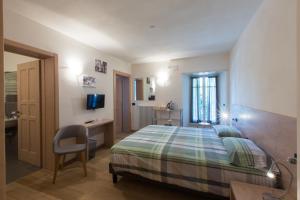 Foto dalla galleria di Marzia Rooms a Bormio