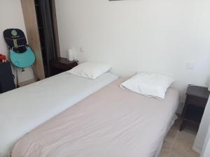 Postel nebo postele na pokoji v ubytování La maison calme