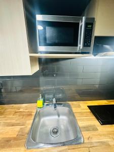 Photo de la galerie de l'établissement Sky Cove - Skyline, River Vibes, à Windsor 7 autres photos