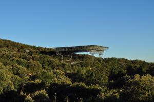 a building on top of a hill with trees at La Cabala de Ibeas in Ibeas de Juarros