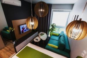 Televízia a/alebo spoločenská miestnosť v ubytovaní RGB studio