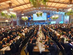 a large crowd of people sitting at tables in a banquet hall at Castle de Wildt in Modimolle +27 photos