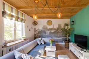 Et tv og/eller underholdning på Apartament Varmia