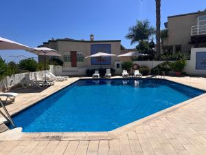 Swimmingpoolen hos eller tæt på ChicFlat Las Lomas Piscina y vistas al mar