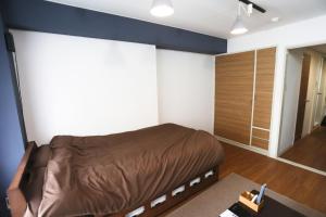 En eller flere senge i et værelse på BetterЯ03青森橋本208号室