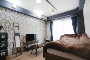 Et tv og/eller underholdning på BetterЯ03青森橋本208号室