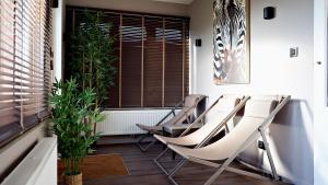 Billede fra billedgalleriet på Gîte familial 6 pers balnéo proche Pairi Daiza i Brugelette