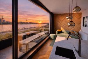 Posezení v ubytování Kaai11 - Riverview Lofts & Suites