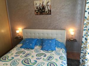Postel nebo postele na pokoji v ubytování Résidence Bab Sebta + 37 fotografií