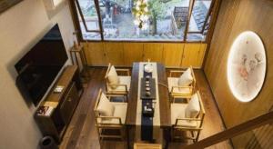 TV a/nebo společenská místnost v ubytování Hangzhou Teavilla Hotel