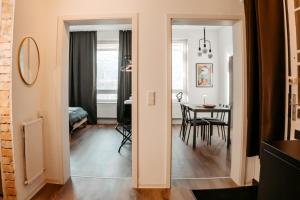 Khu vực ghế ngồi tại StaySimplyHaven - Modernes City-Apartment, King-Size Bett, 55'' Smart-TV, Self Check-In +25 ảnh