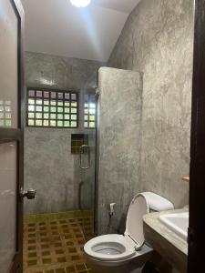 Et badeværelse på Rice n' Retreat Homestay