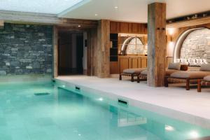 Bazén v ubytování Le Refuge Chez La Tante - Mont d'Arbois, ski in - ski out nebo v jeho okolí