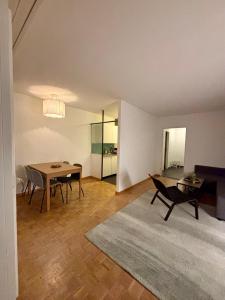Khu vực ghế ngồi tại Living Cozy in Bern