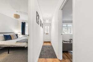 Postel nebo postele na pokoji v ubytování Urban Stay