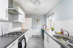 Kuchyň nebo kuchyňský kout v ubytování Urban Stay