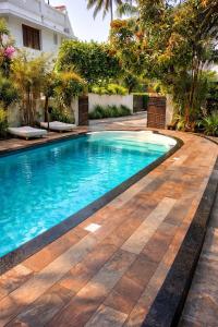 Bazén v ubytování Parudeesa - Heavenly- Luxurious Palace look-Near CBD - Kerala - India with Breakfast nebo v jeho okolí