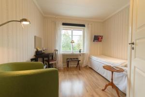 TV a/nebo společenská místnost v ubytování Hotell Stensborg