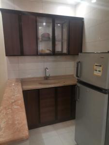 Køkken eller tekøkken på شقق مزون للشقق المخدومة