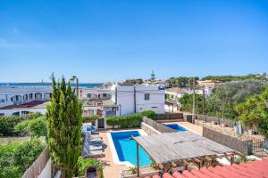 a view of the pool from the roof of a house at Villa Punta Rosa in Punta Prima