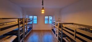 En eller flere senge i et værelse på Le Gîte des Travailleurs + 30 billeder