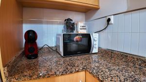 Køkken eller tekøkken på Apartalux San Pedro Playa