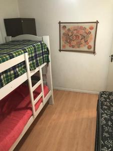 En eller flere senge i et værelse på apto centro