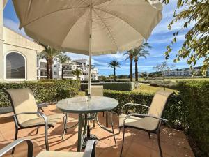 En balkon eller terrasse på Hacienda Apartment