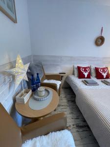 Postel nebo postele na pokoji v ubytování Willa Avita