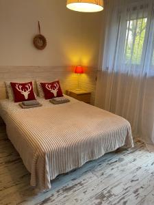 Postel nebo postele na pokoji v ubytování Willa Avita