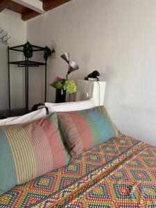 Giường trong phòng chung tại Casa Vacanza Castagna