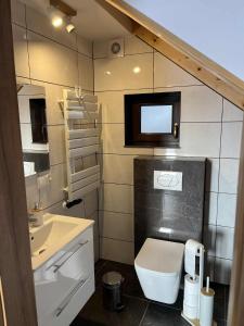 Koupelna v ubytování Apartament Górska Przystań + 7 fotografií