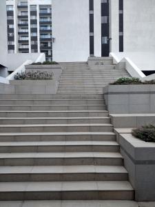 a set of concrete stairs in front of a building at Serenity Apartment Artesano in Nairobi