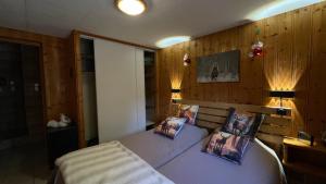 Postel nebo postele na pokoji v ubytování Profiter du calme de la montagne vosgienne