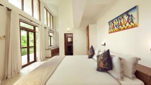 Giường trong phòng chung tại Glasshouse Victoria +11 ảnh