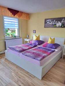 Postel nebo postele na pokoji v ubytování Ferienwohnung Familie Windt