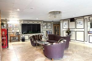 Khu vực ghế ngồi tại Motel 19 By Capital O Baytown I-10 +20 ảnh