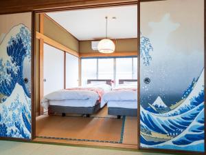 Giường trong phòng chung tại tazuraya-seto-一棟貸切-無料駐車場